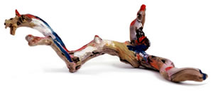 Birth 5x18x3 in. driftwood, acrylic paint, china ink